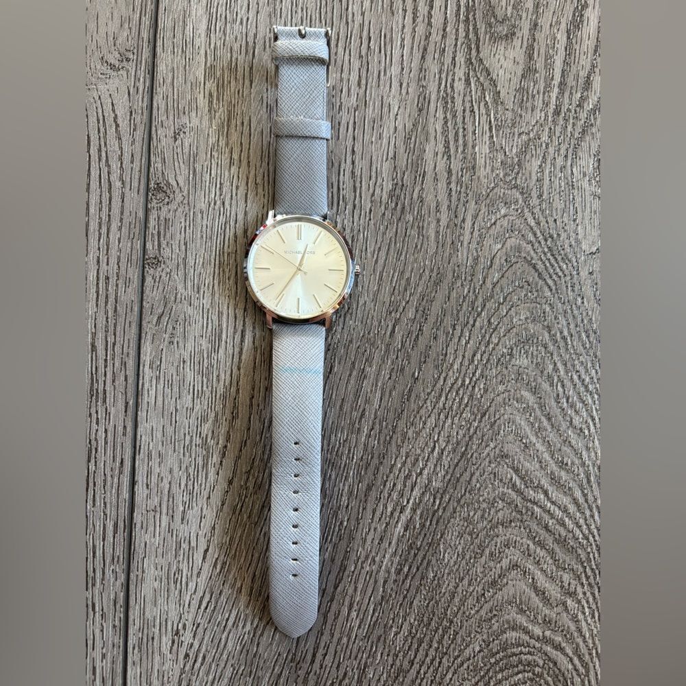 Michael Kors woman’s Elegant Silver Watch used in good condition